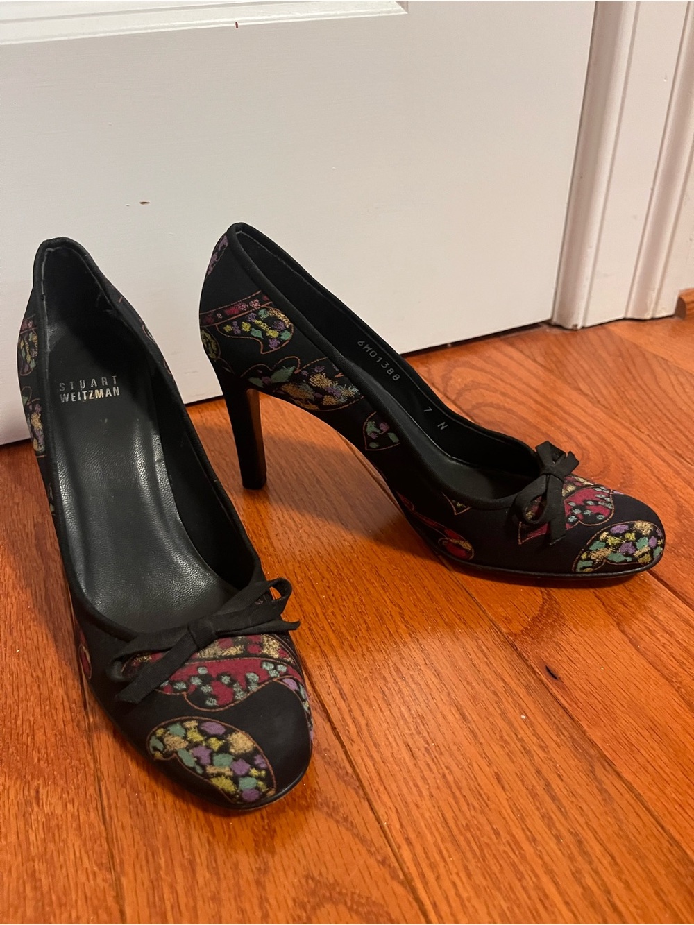 Stuart Weitzman Black Pumps with Multicolor Floral Accents